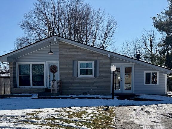 Parking includes driveway, adjacent concrete parking pad and street parking.
