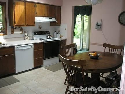 Kitchen
						:
						Large eat-in kitchen with garden window and new ceramic tile floor.