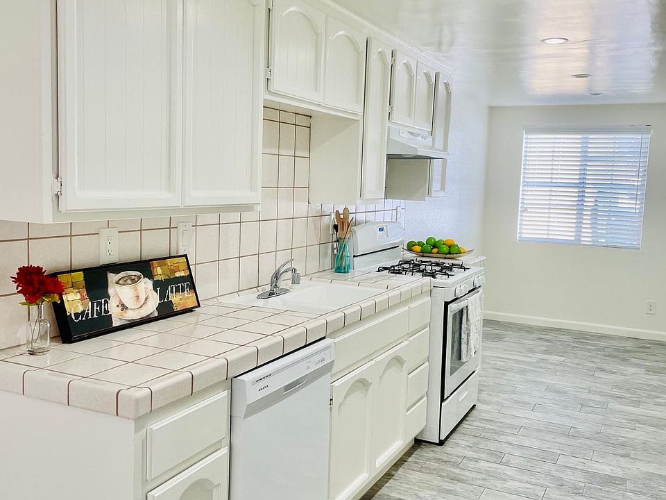 Update kitchen with stove-oven and dishwasher.