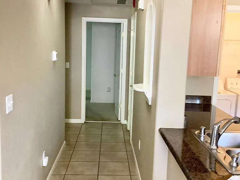 Hallway to bedrooms and bathrooms.