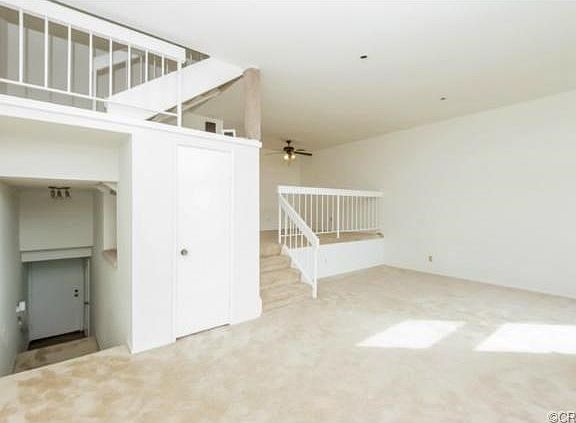 Open floor plan, living room with adjacent dining room.
