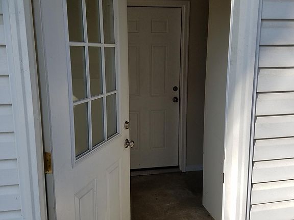Exterior building door (leads to front door of apartment)
