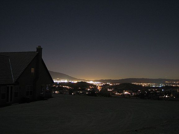 City Lights View with Yard and House in Background