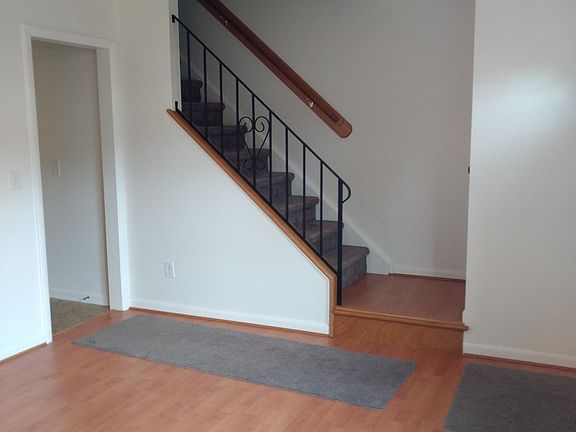 living room area, and steps to bedrooms