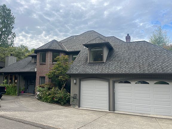 2 car garage parking and lots of additional outside parking.