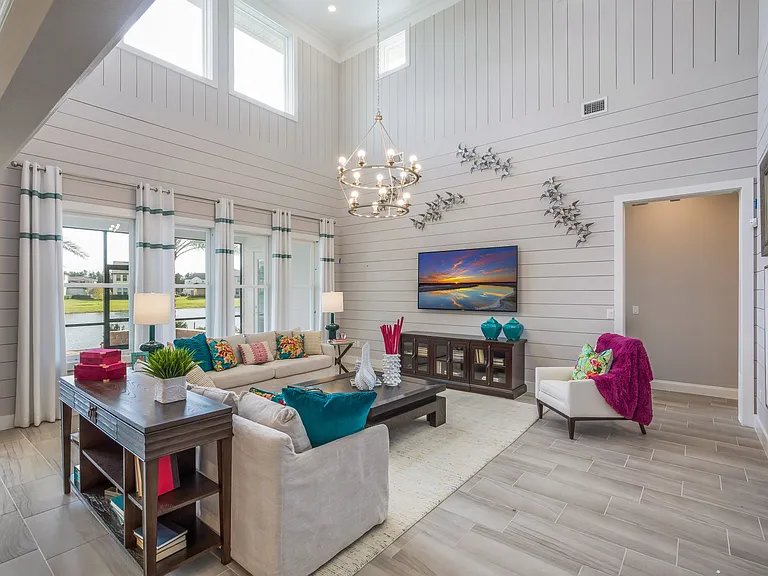 model home pic of the leaving room with 24 feet high sealing