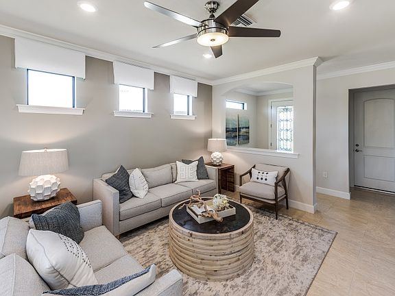 Model Representation Spacious foyer entrance and gathering room