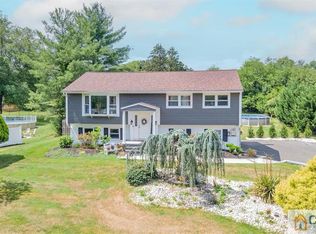 5 Farm Tree Rd, Manalapan, NJ 07726