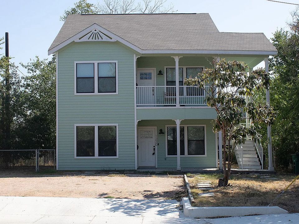 Corner House with a backyard, and parking spot no more off street parking