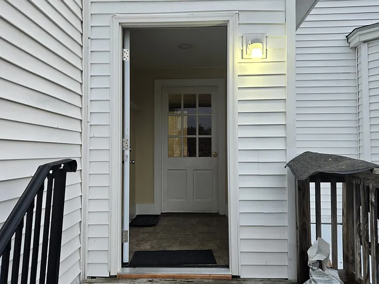 Front door (2 steps) and Entrance Foyer