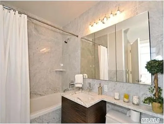 Sold by Douglas Elliman | media 23