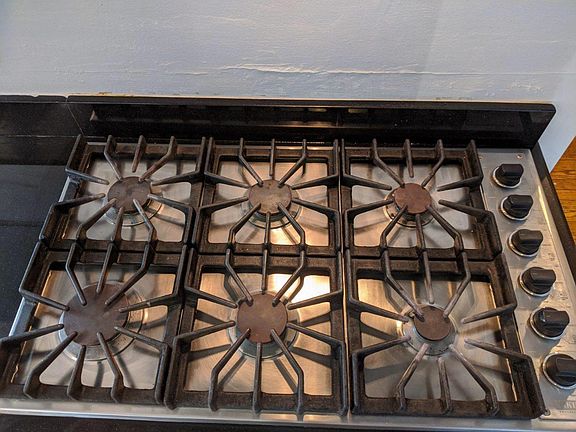 Kitchen: Stainless double oven, 6 burner Viking range, microwave, refrigerator, garbage disposal, triple sink, under cabinet L.E.D. lighting. Approx 14x11 (133 sq ft when you take out unusable space)