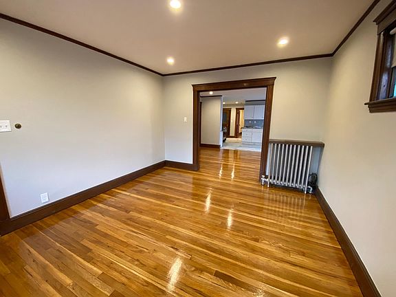Living room looking into Dining room / Kitchen