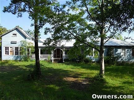Over 100' wide angle view of side porch