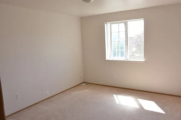 Living room (before installation of vinyl plank flooring)