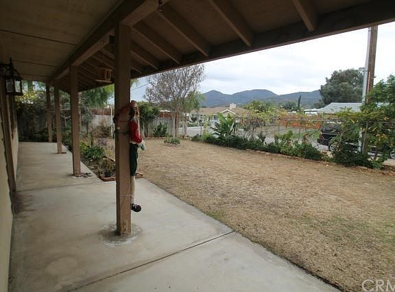 Covered front porch with mountain views