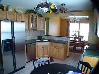 Completely remodeled kitchen with Silestone counters and stainless appliances