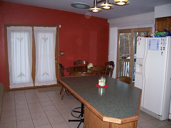 Tiled Kitchen and dining area