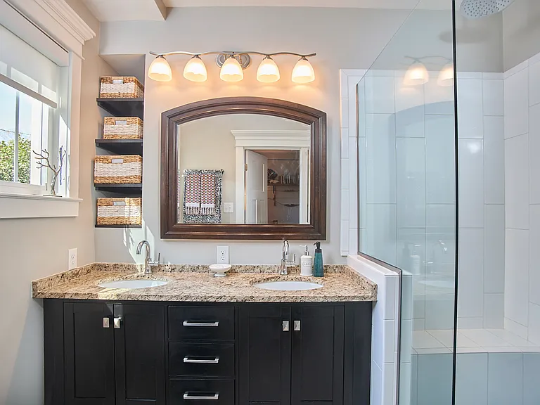 Master bath with oversized shower and three shower heads
Tankless water heater