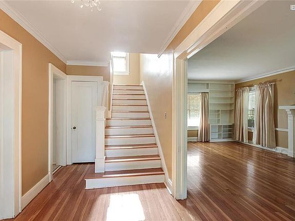 The large center entry provides access to the living room, dining room and kitchen.