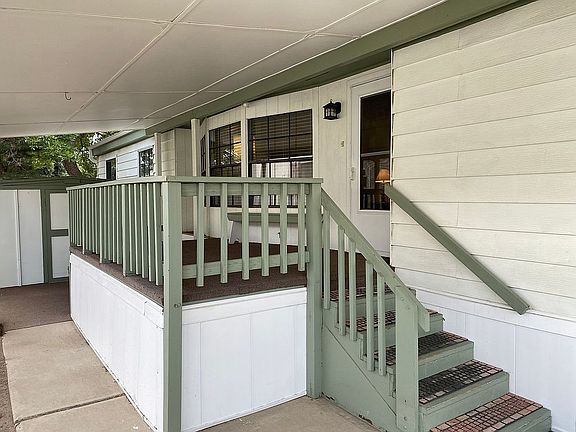 2nd image of 8201 S Santa Fe Dr Lot 203