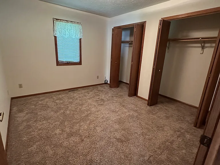 Bedroom 1 with two large closets