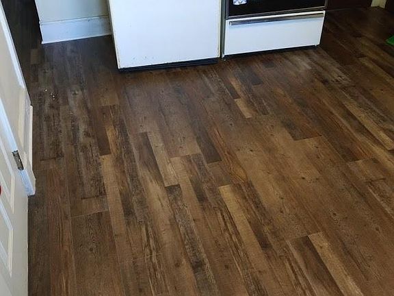 Beautiful & easy to clean antique wood tile flooring! Other kitchen pictures were from earlier listing and do not show this.