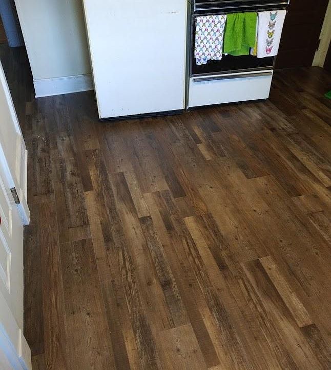 Beautiful & easy to clean antique wood tile flooring! Other kitchen pictures were from earlier listing and do not show this.