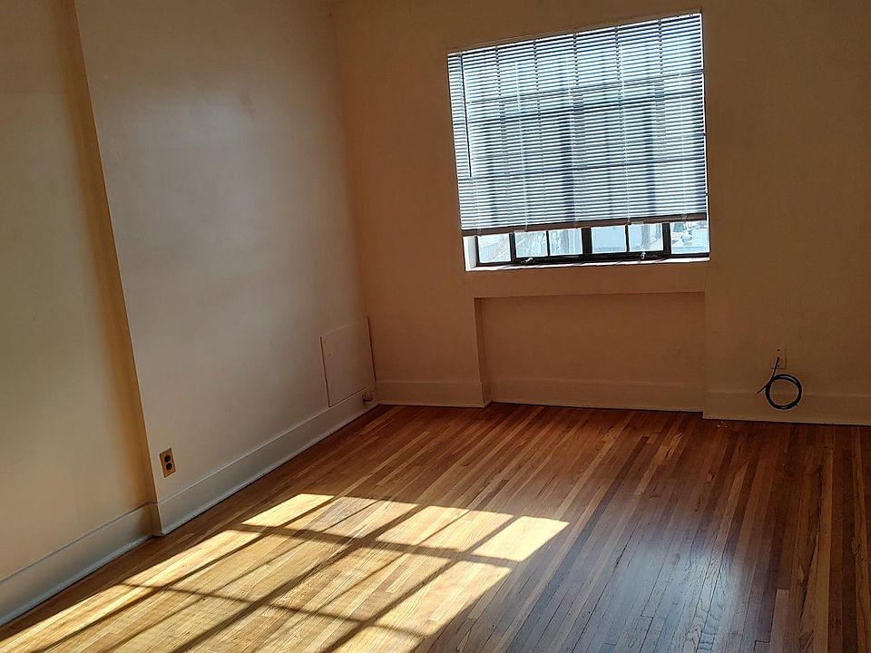 Bedroom with walk-in closet