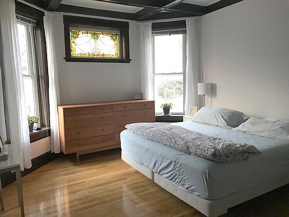 Master bedroom with king size bed.