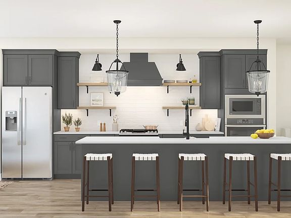 Kitchen with vast center island pendant lights