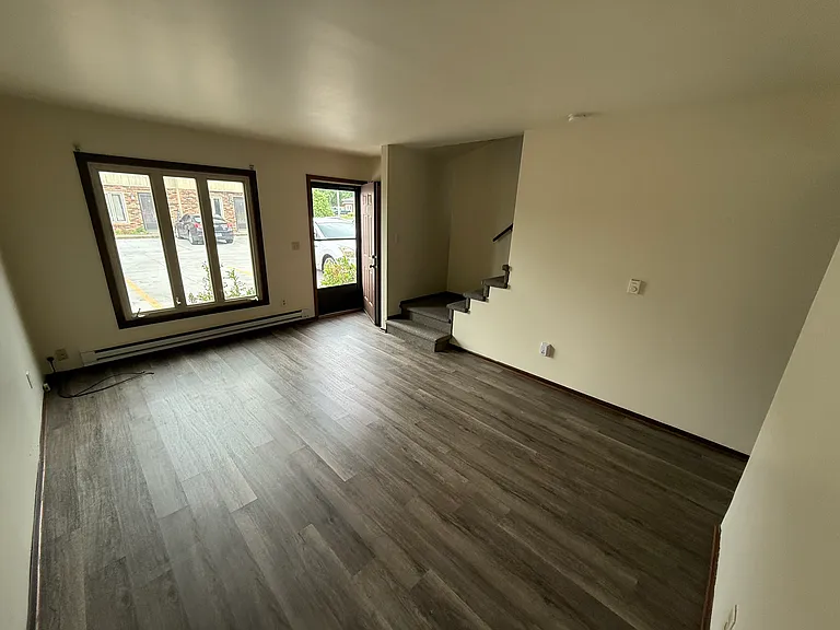 Living room comfort with plenty of space to stretch out and watch your flat screen TV mounted on the wall! Coat closet right inside the front door.