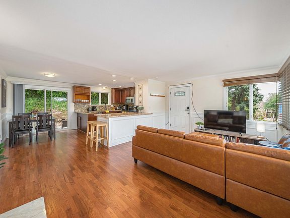 Open concept living-kitchen-dinning areas