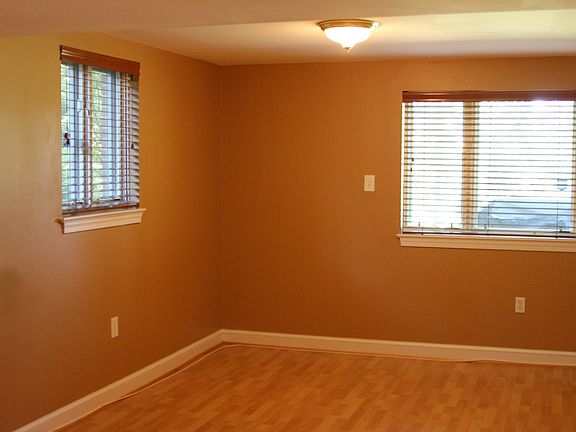 Bedroom with 3 large windows