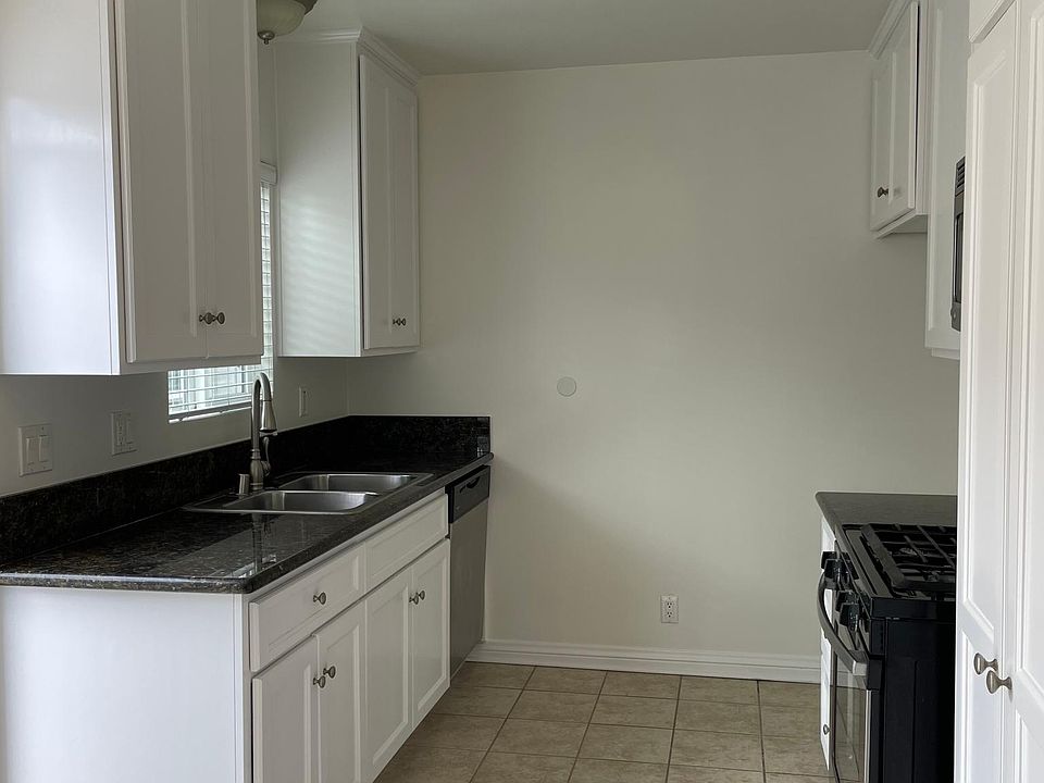 Kitchen has a back door. The kitchen is has plenty of room for a kitchen table.