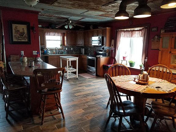 Kitchen, Dining, bar w/ 4 bar stools