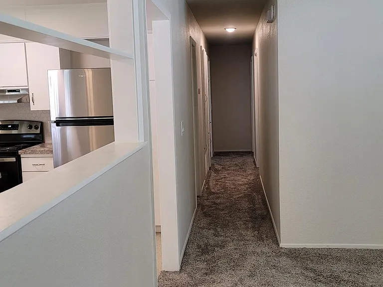 Hallway as seen from livingroom.
19'6"x 2'11"