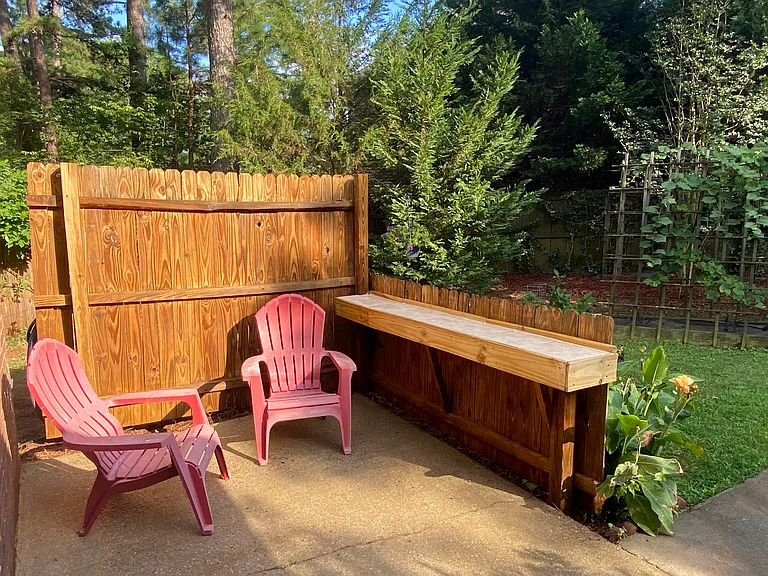 Outdoor furniture included.
Secluded back yard
Lots of flowers and greenery