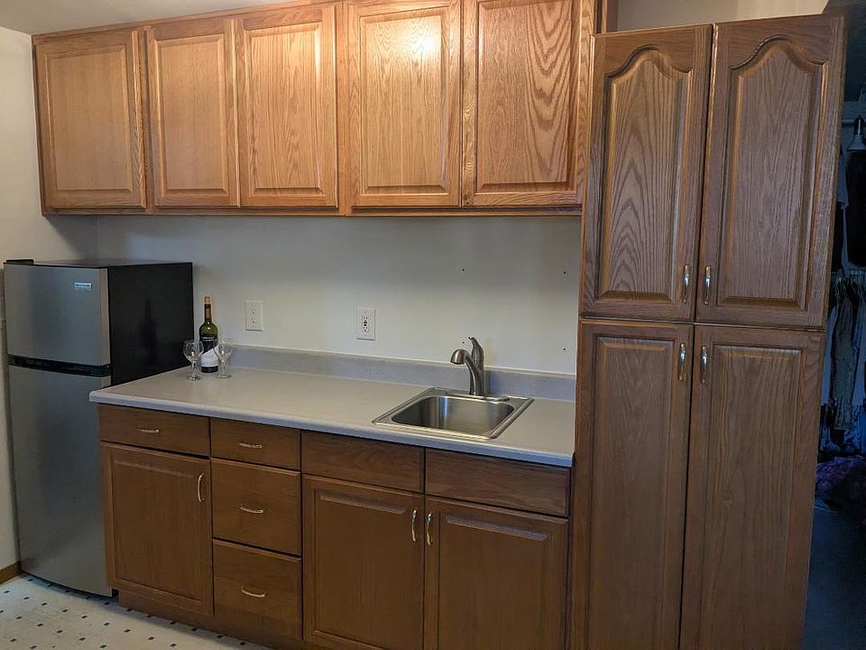Downstairs kitchenette has plenty of cupboards, enought for a couple to live privately downstairs.