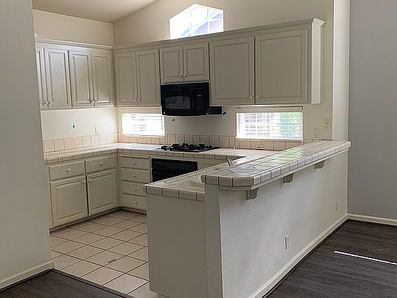 Kitchen overlooks den 