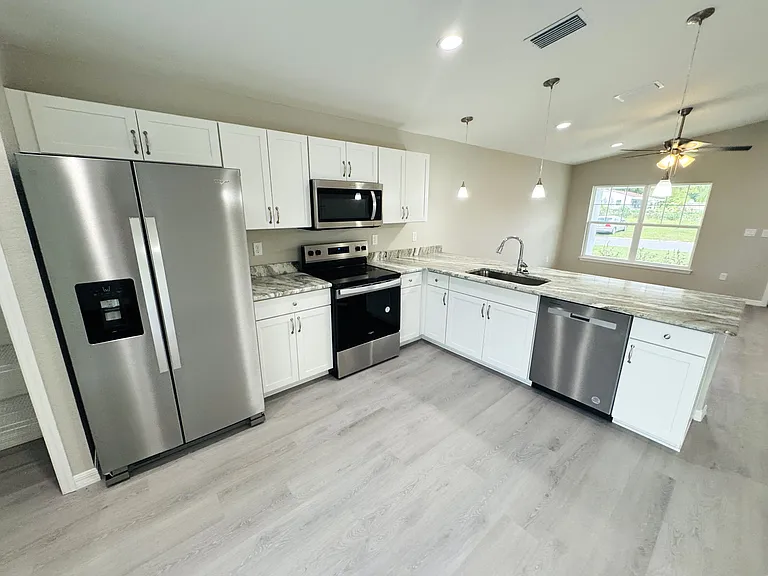 6574 SE 108th St — Photo 3