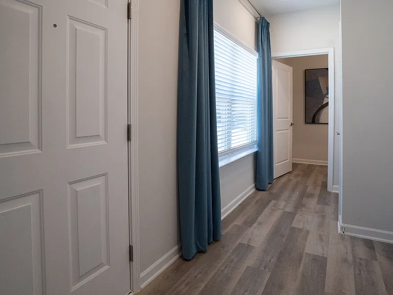 Entryway to the Tuscon layout with large window letting in natural light.