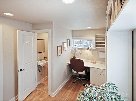 1st floor powder room and built in desk.