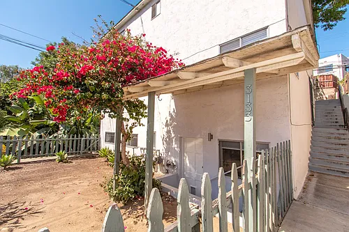 Charming Cottage Style Studio With Fenced in Yard in the Pocket of North Park + South Park Photo 1