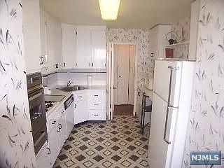 4th image of 2077 Center Ave APT 22G