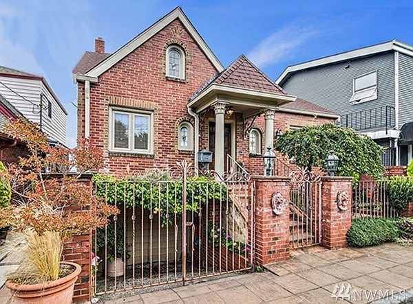 Stately 1929 Tudor-style home in West Seattle's affluent North Admiral neighborhood, close to everything.