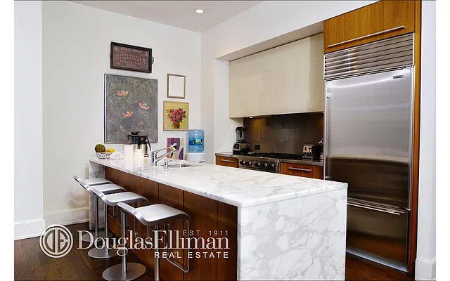 Sold by Douglas Elliman | media 11