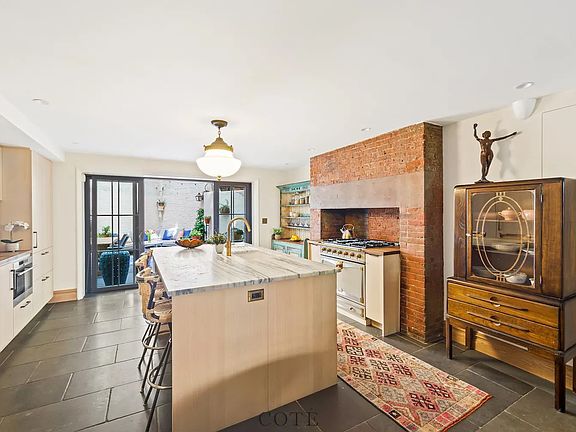 5th image of 122 E 10th St APT 1-2