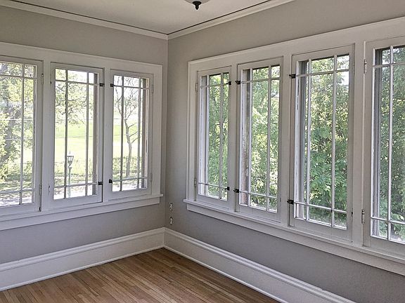 South facing bonus sunroom overlooks Town & County Golf course.