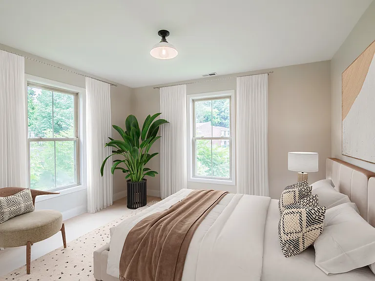 Welcome to Waterfront at the Strand, where modern elegance meets comfort. This stunning bedroom features large windows for ample natural light, stylish decor, and a serene atmosphere. Schedule your visit today and see your future home!